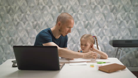 learning of father and little daughter