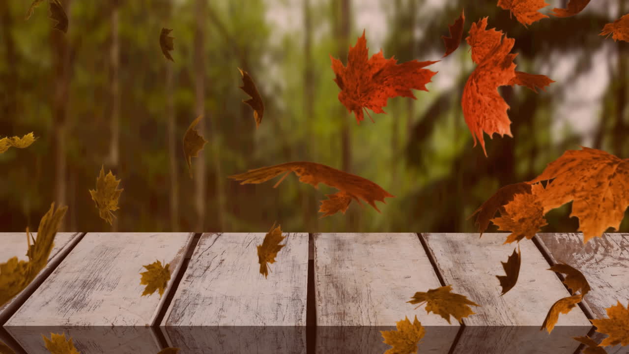 animación digital de múltiples hojas de otoño flotando sobre la superficie de madera contra el bosque