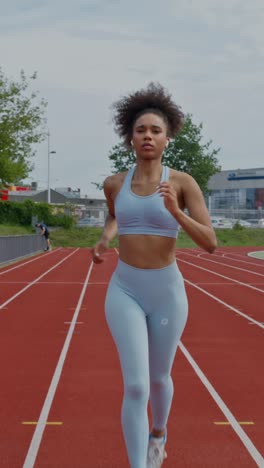 woman running on a track