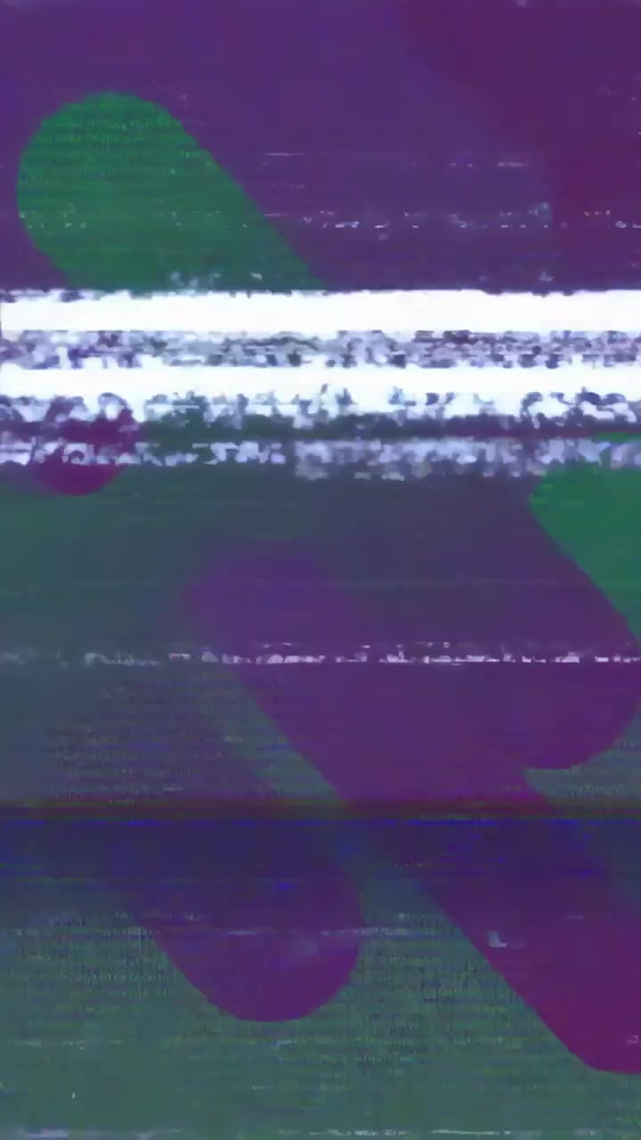 Vertical video: Glitching forcing green blobs and purple bands shifting, showing signal noise