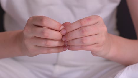 tensed hands of nervous woman with anxiety and stress disorder. closeup shot