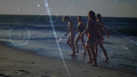 animation of networks of connections over happy group of friends having fun, walking along beach