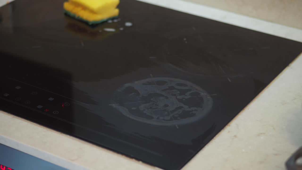 Cleaning an induction cooktop