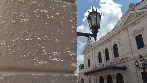 national theatre in panama city old town, exterior of old colonial buildings, revealing view