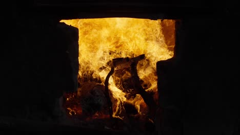 zoom out slow motion shot of a wood furnace