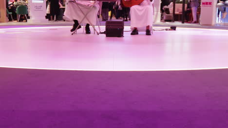 live band playing traditional music and instruments representing saudi arabia at world travel market.