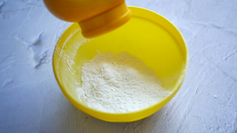 top view of baby powder on white background