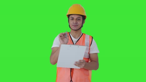 Feliz-Trabajo-De-Construcción-Indio-Escribiendo-Notas-Pantalla-Verde