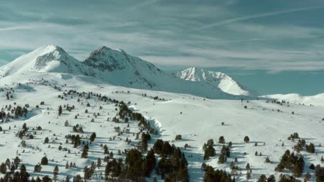 andorran pyrenees mountain landscape, winter 4k aerial view