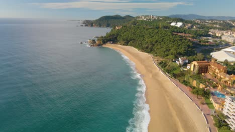 mediterranean beach paradisiaca turquoise blue waters no people aerial view drone spain catalunya costa brava blanes lloret de mar mallorca balearic islands