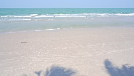 waves on the beach during low tide