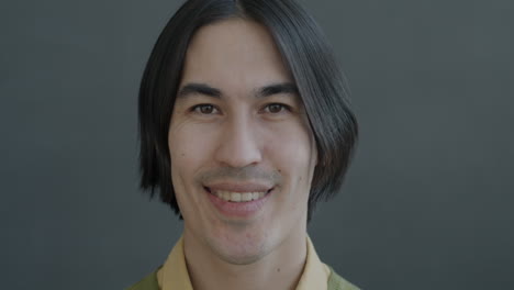 portrait of a smiling asian man