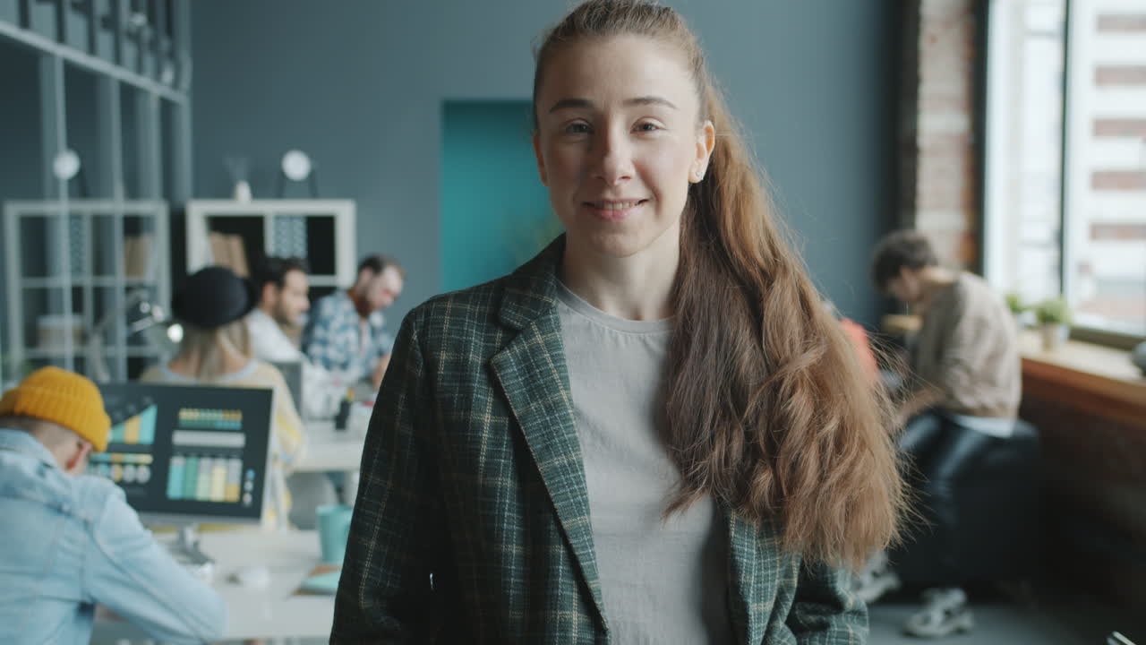 Woman in Office with Team