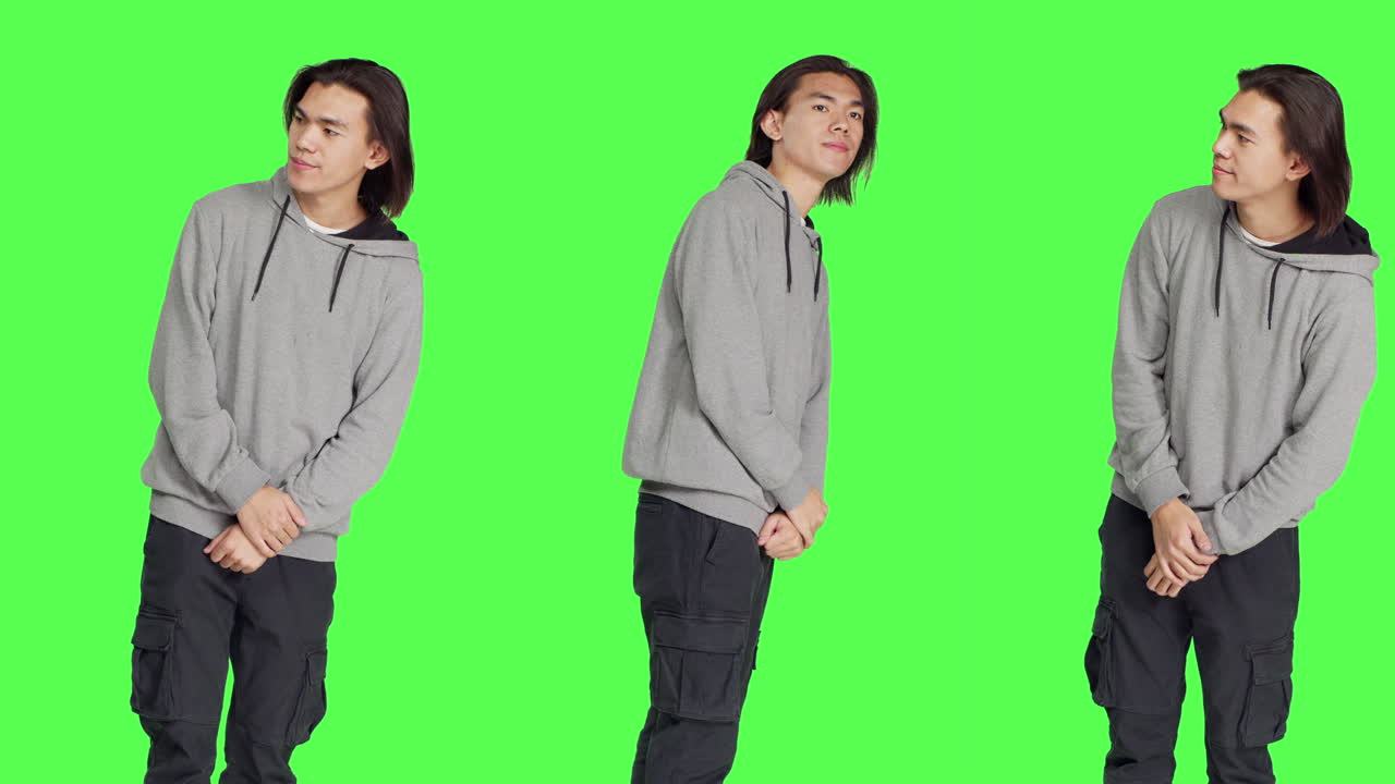 젊은 남성 모델이 시계를 보고 있습니다.