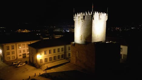 Aerial-orbit-around-castle-tower-at-night-in-Chaves-Vila-Real-Portugal