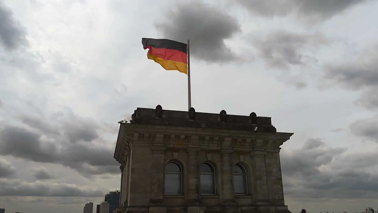 flag on Rooftop Of The German Parliament - Reichstag