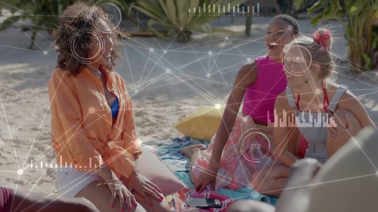 3 women on beach speaker glancing sharing story while HUD gauges tracking gestures for marketing