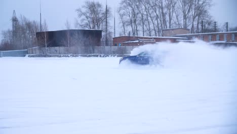 car drifting in snow