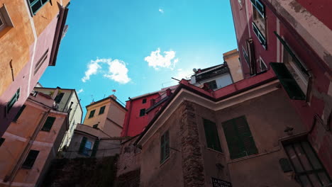 vibrant view of narrow street in vernazza, cinque terre with colorful buildings