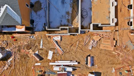 installation of wooden with roof beams frame trusses construction on pouring the foundation for a new building