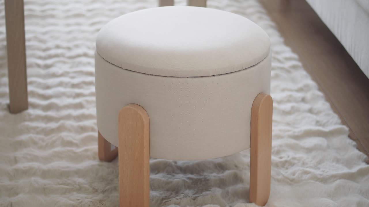 Light Gray Storage Ottoman in a Living Room