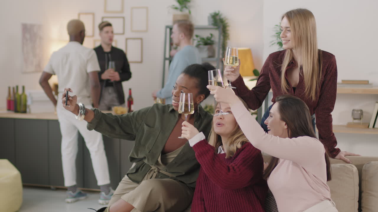 Happy Women Taking Selfie at House Party