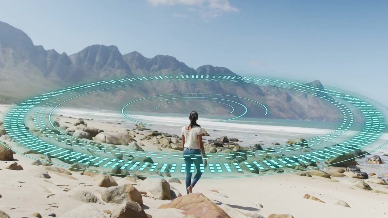 Woman walking rocky beach, turquoise AR rings activating on approach, tracking position toward sea
