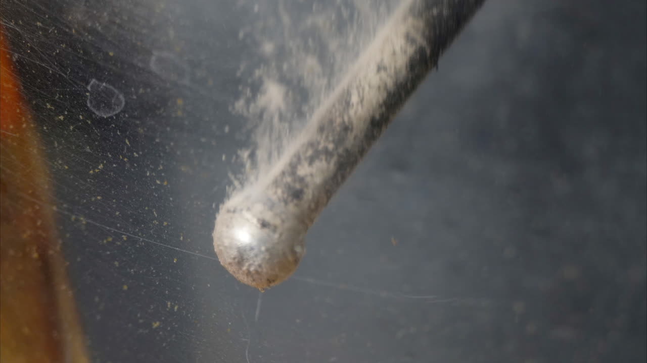 Tommy bar on c-clamp bubbling in timelapse motion during electrolytic cleaning