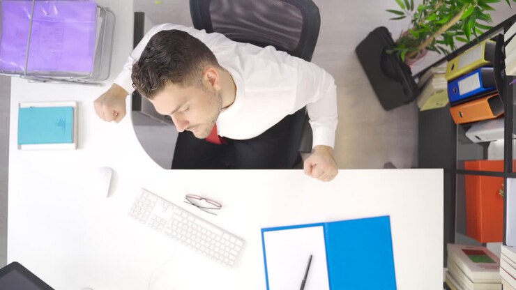 Relaxing businessman. Relaxation and stretching.