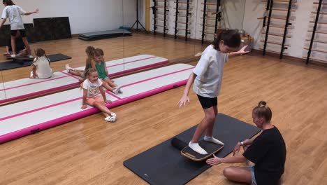 children learning balance and coordination exercises