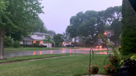 Car-driving-on-street-during-rain-storm