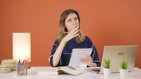 Confused young woman thinks and can&#039;t figure it out.