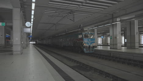 empty train station platform with train