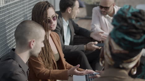 slow motion of colleagues brainstorming outdoor on summer day