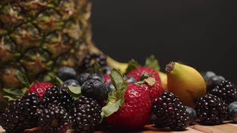 fruits spinning on a cutting board