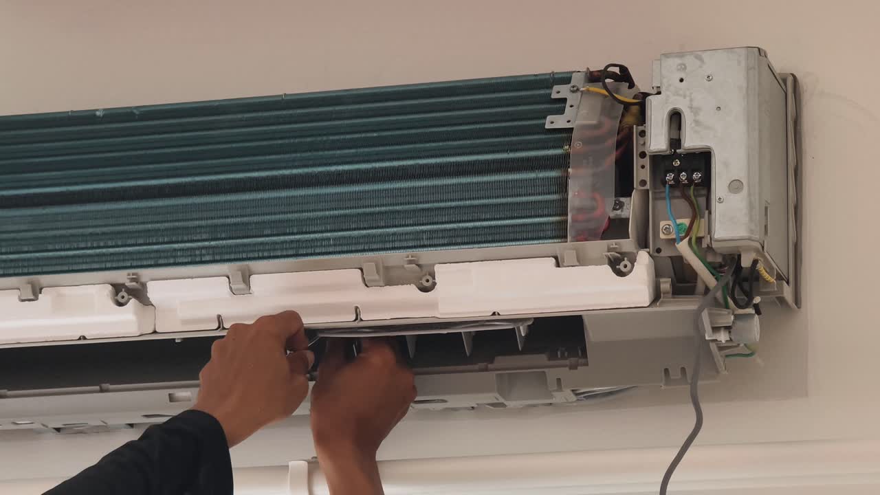 Air Conditioner Repair/Maintenance in Progress