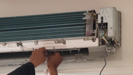 air conditioner repair/maintenance in progress