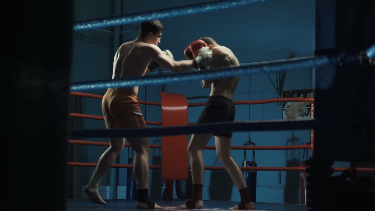 Kickboxing Training Session in a Ring