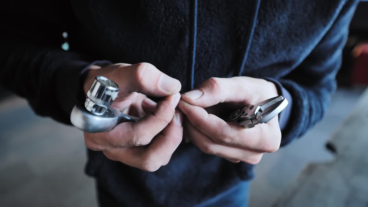 Worker’s hands carefully extracting splinter reflecting effort and perseverance