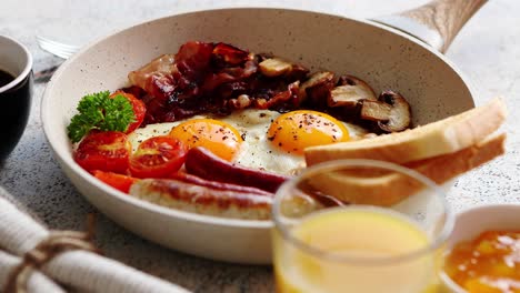 full english breakfast served in a pan