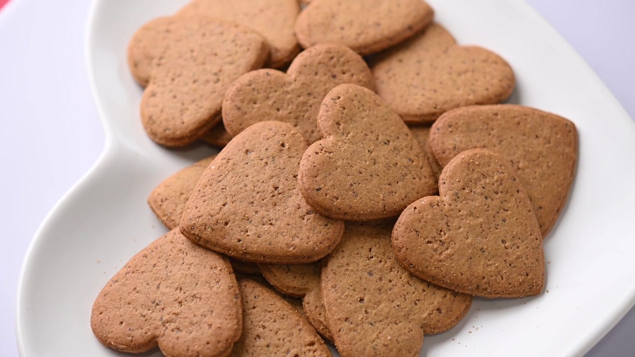 Heart Shaped Valentine Cookies Rotating on Plate