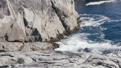 waves breaking on rocky shore