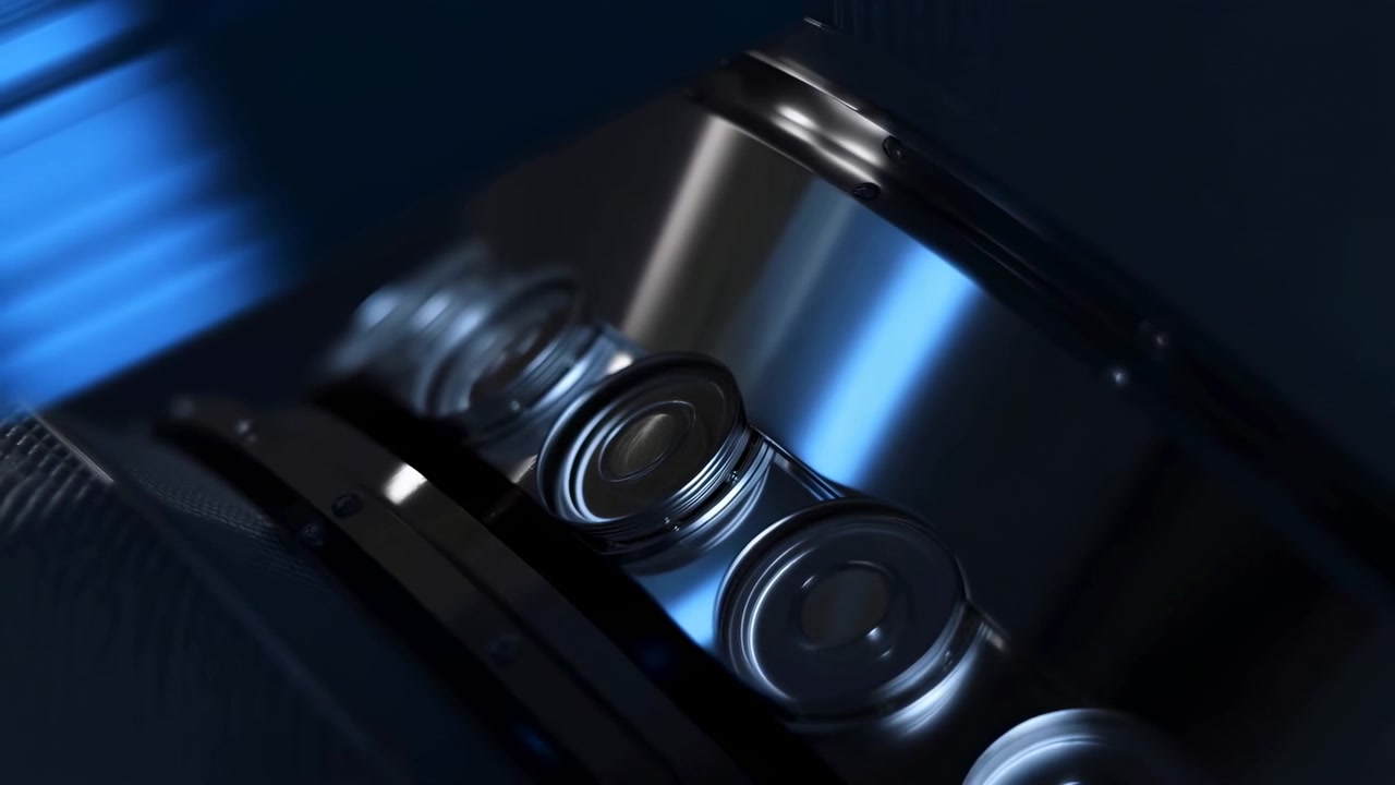 Close-up polished engine pistons under cool blue studio lighting with shifting highlights, diagonal composition, glossy metal surfaces, machining marks, and shallow focus