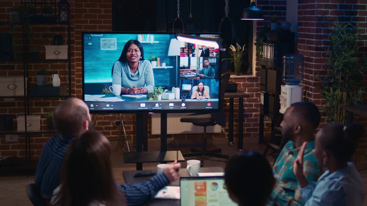 Employees and remote team company revenue discussion in videconference