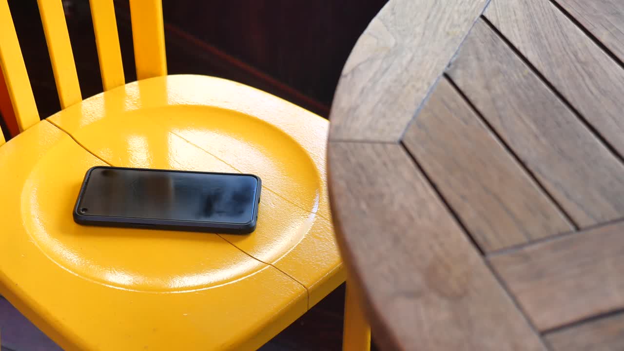 Phone on a yellow chair