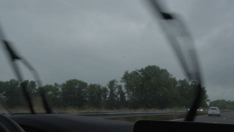 driving on a rainy highway