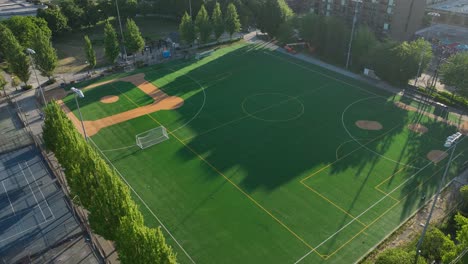 drone shot of a multipurpose playfield in seattle at sunrise