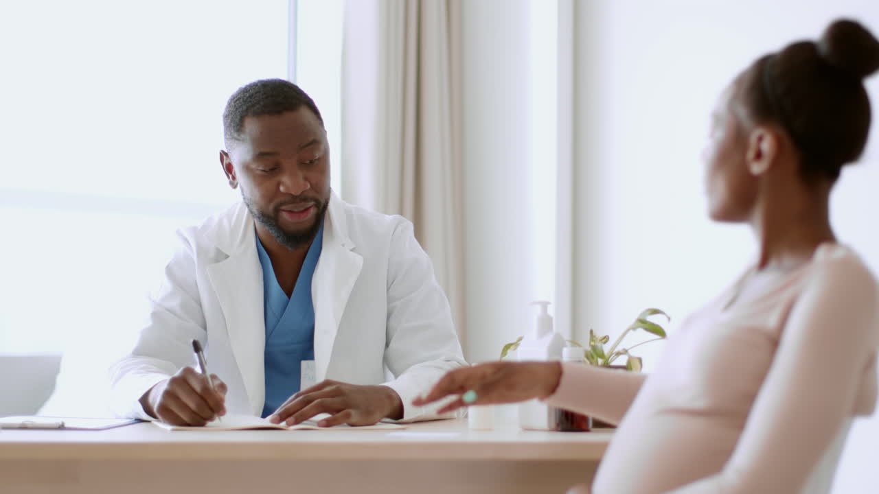 Doctor Consultation with Pregnant Woman