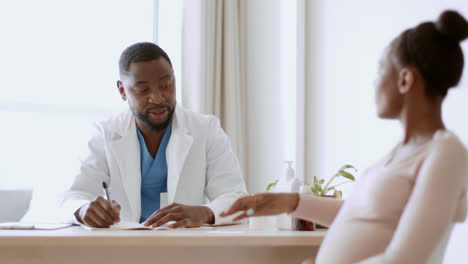 doctor consultation with pregnant woman