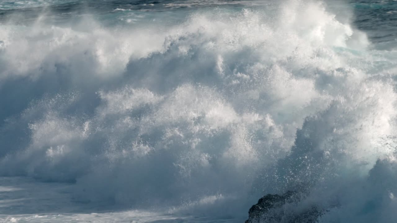 Powerful Atlantic waves crash against the rugged volcanic coastline near Timanfaya National Park in Lanzarote, part of Spain’s Canary Islands.